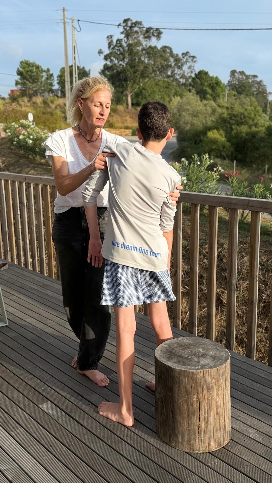 Naomi guiding a standing person's balance