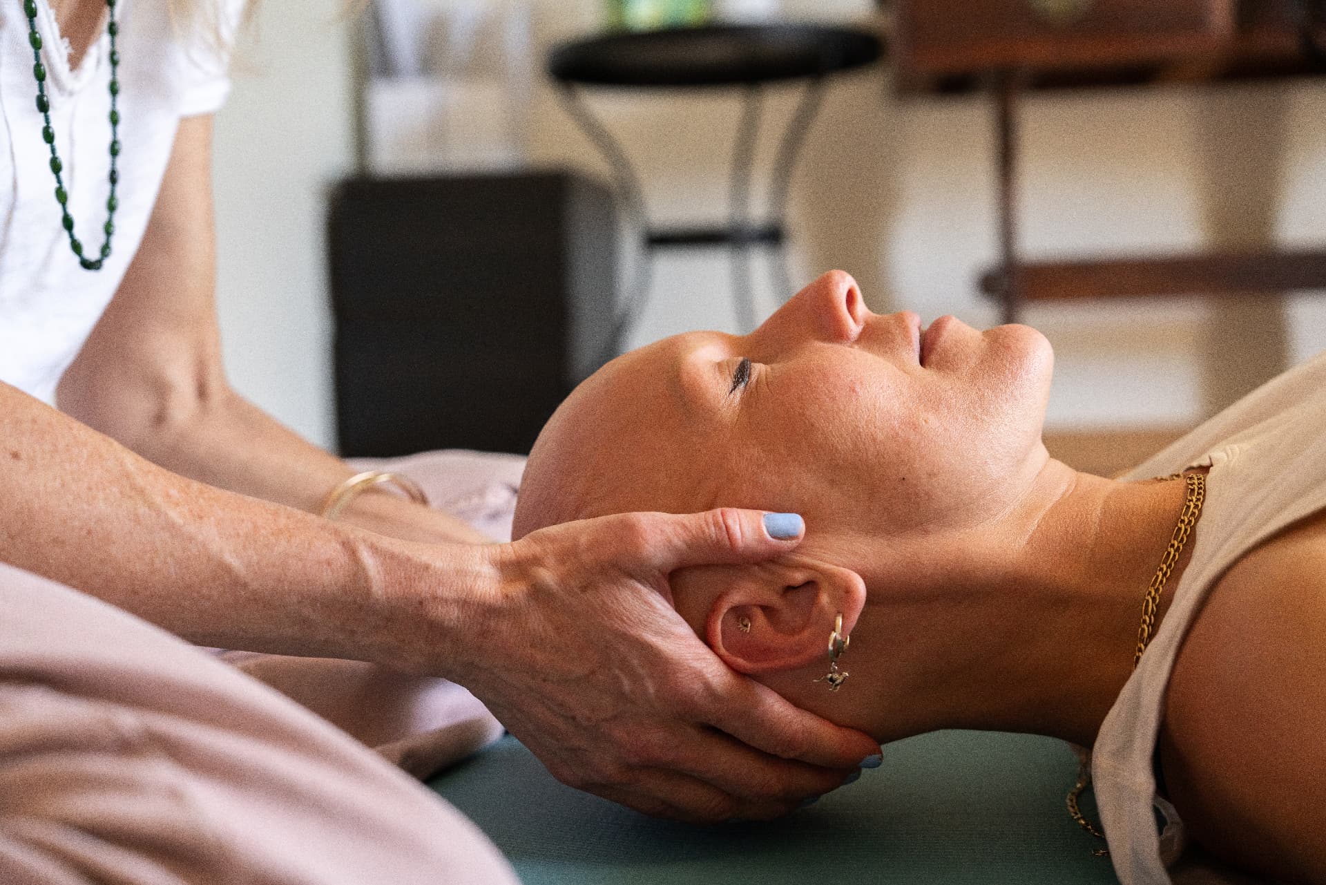 Naomi working hands-on with a client